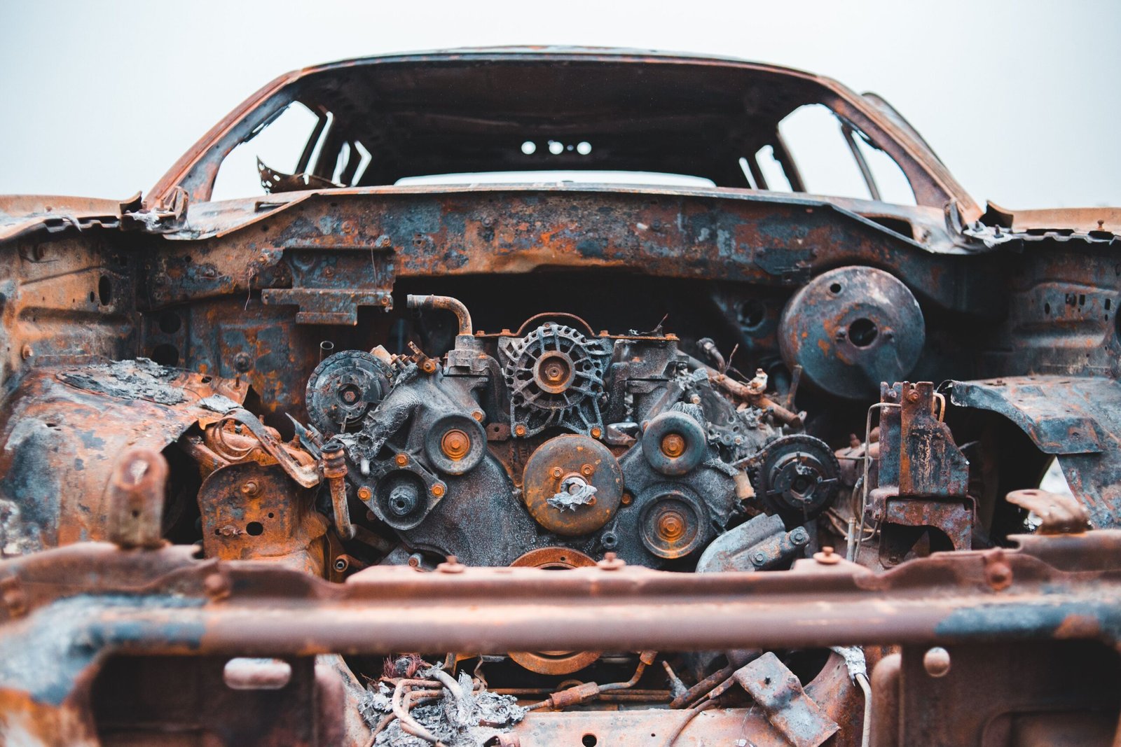 Rusty damaged car prepared for scrap and recycling